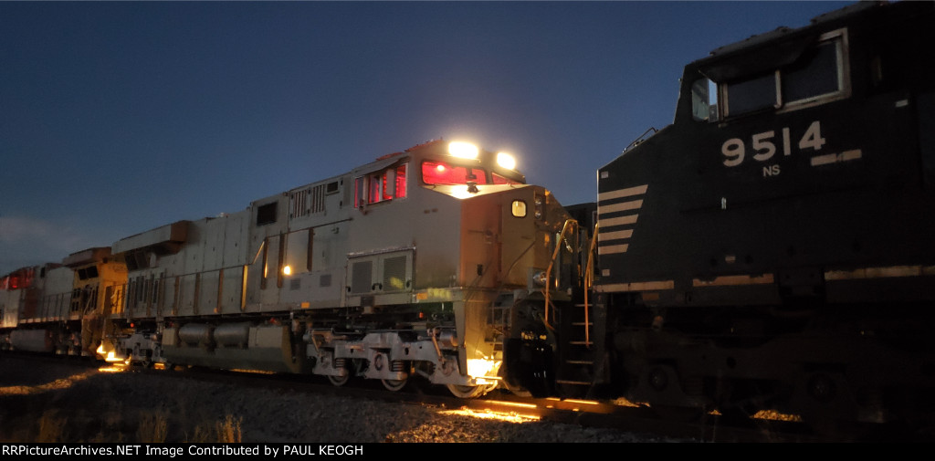 BNSF 3283 and NS 9514 with the 2 UP C44ACM's Photo Using The Cell Phone's Regular Night Focus. What a Difference in Clarity!!!